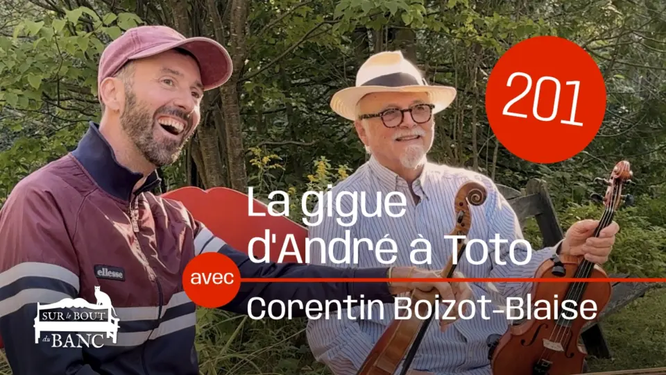 Deux hommes avec violons sur un banc rouge